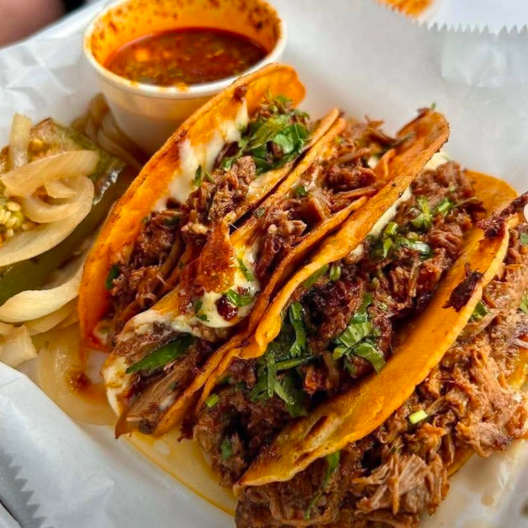 three quesabirria tacos with consomme